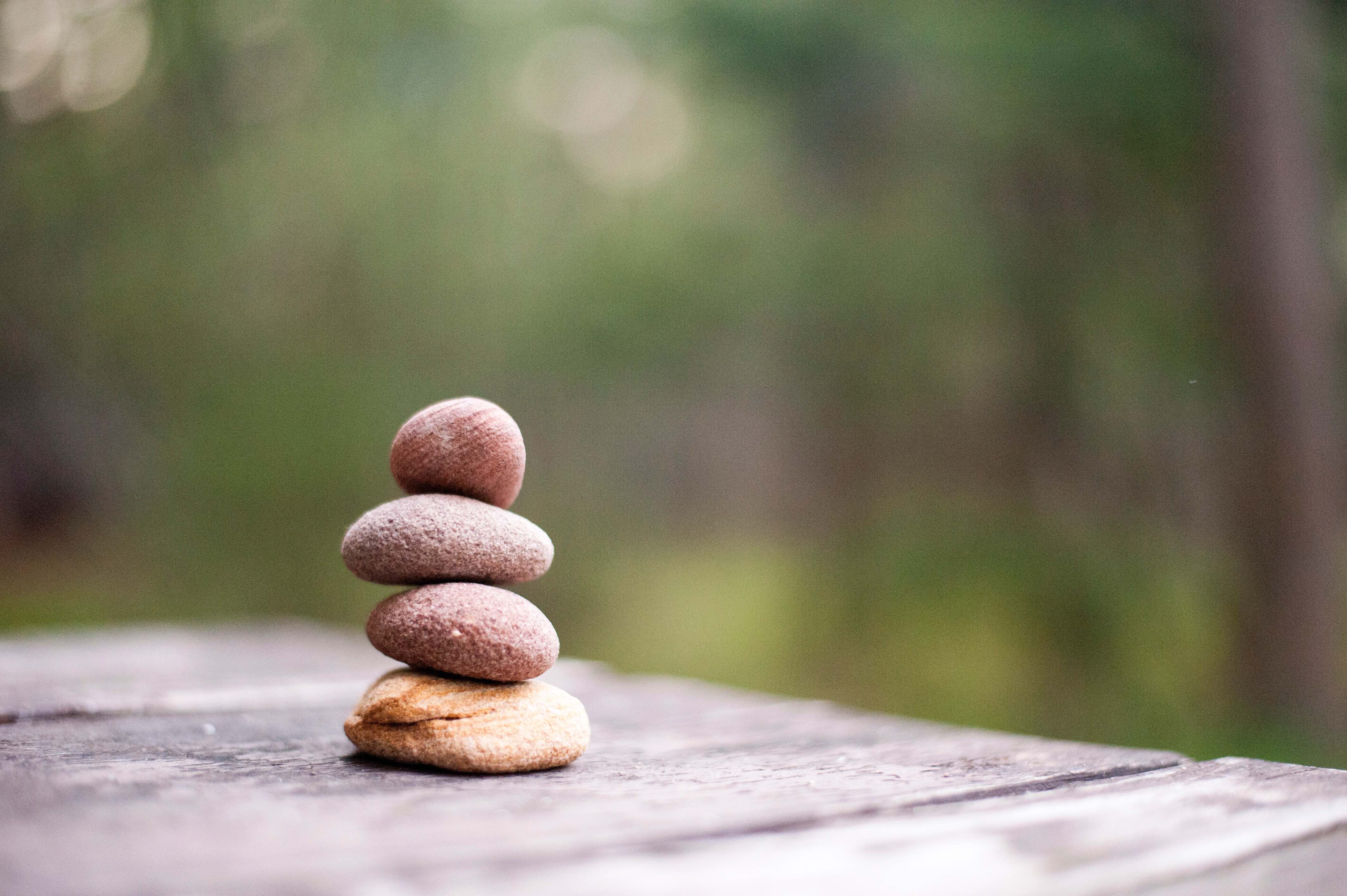 Stacked Rocks on Table Top 