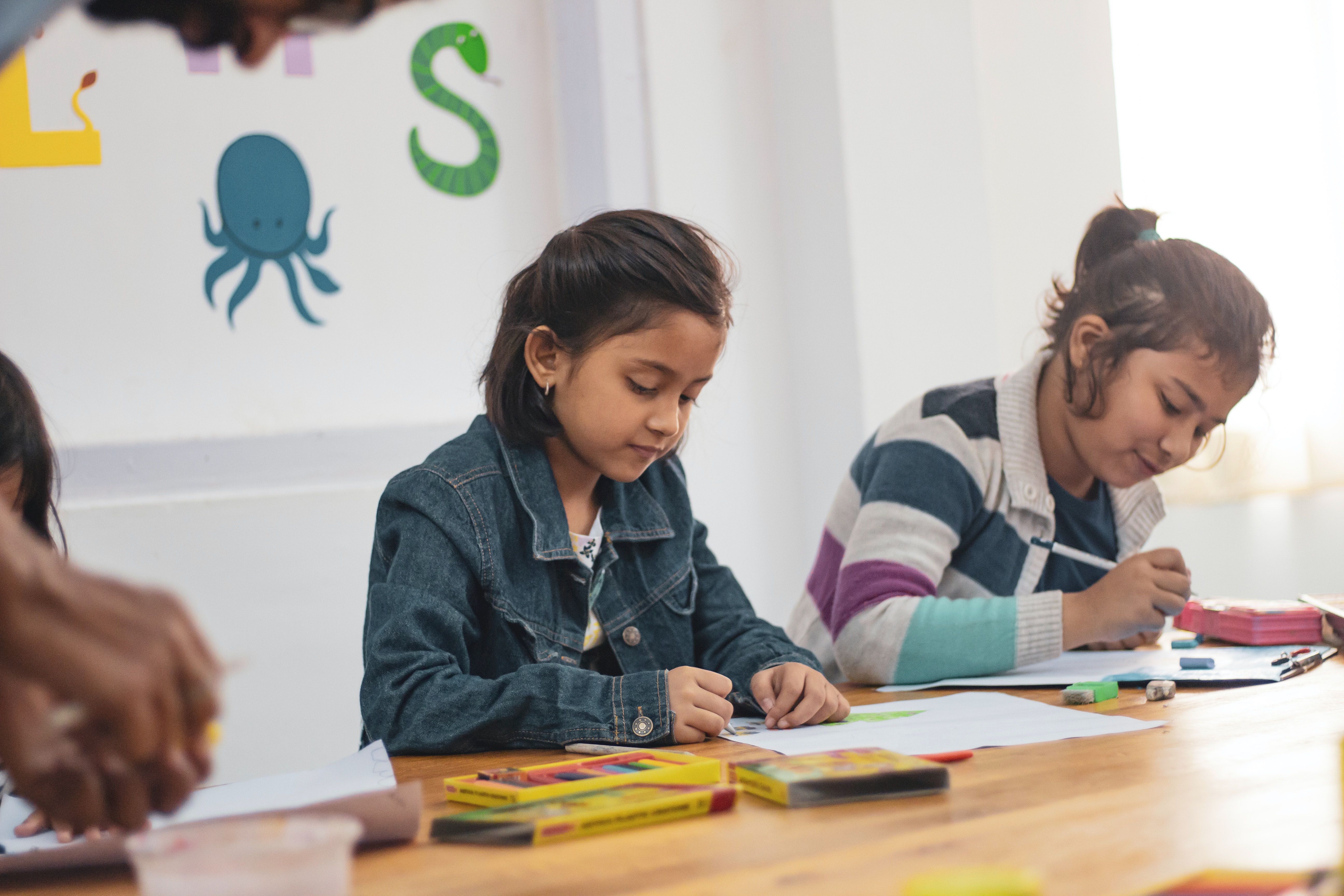 Children Coloring at School
